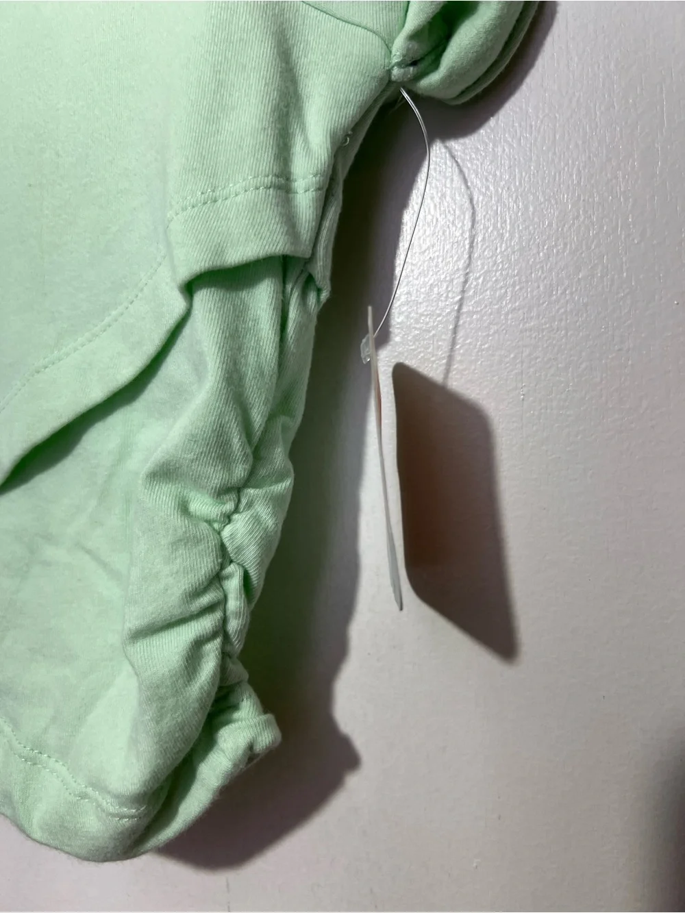 NWT FP Movement Pistachio green hot shot crossover top size L